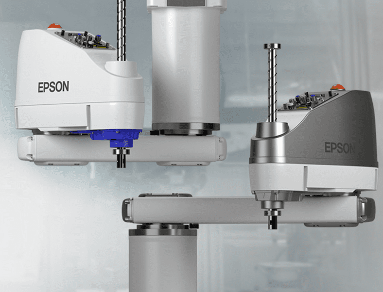 A close up of three machines in the process of machining