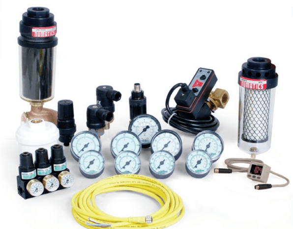 A table with many different types of air tools.