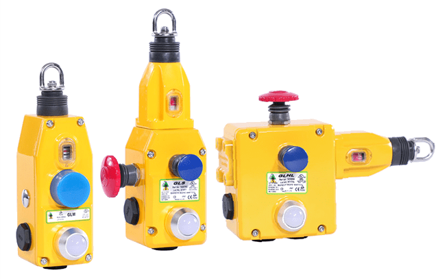A group of four yellow devices that are on a black background.