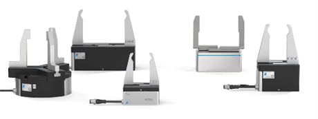A group of four different types of computer monitors.