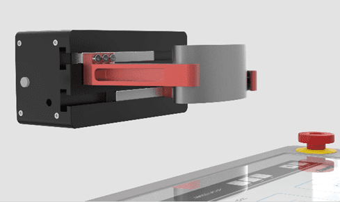 A red handle is on the side of a wall.