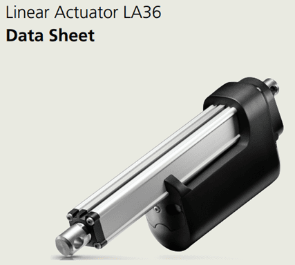 A picture of an actuator that is sitting on the ground.