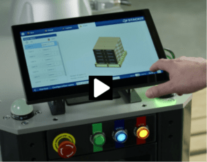 A person is using the touch screen to control the machine.