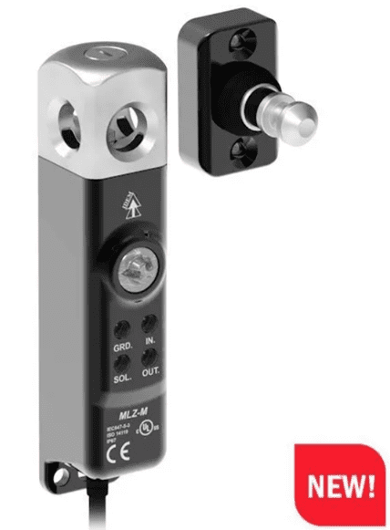 A black and silver device with a red button