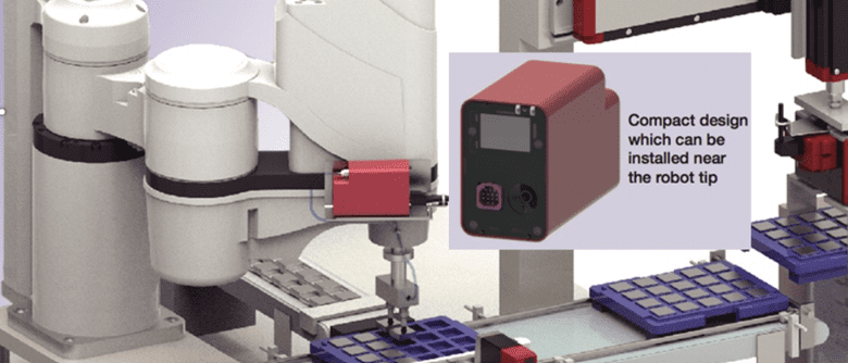 A machine is shown with a red box on top of it.