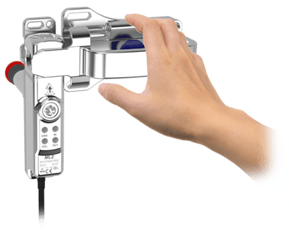 A hand holding a camera with the handle extended.