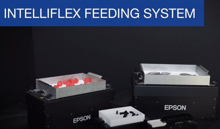 Epson multifunctional feeding system with trays and components.