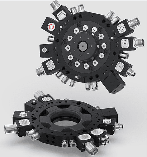Two views of a black mechanical rotary switch with multiple contact points.