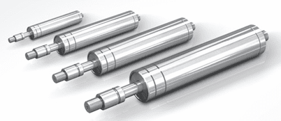 Four polished stainless steel industrial rollers