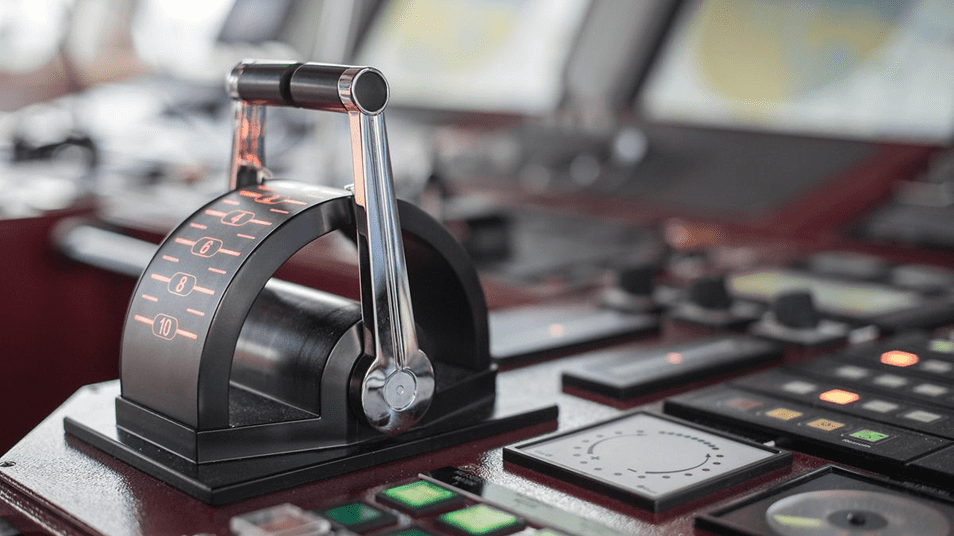Ship engine throttle lever on bridge console