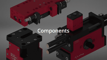 A red and black machine with the word components written above it.